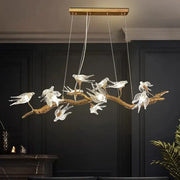 Modern golden bird crystal glass branch chandelier featuring a rustic golden-brown decorbites bird crystal design for living room decor
