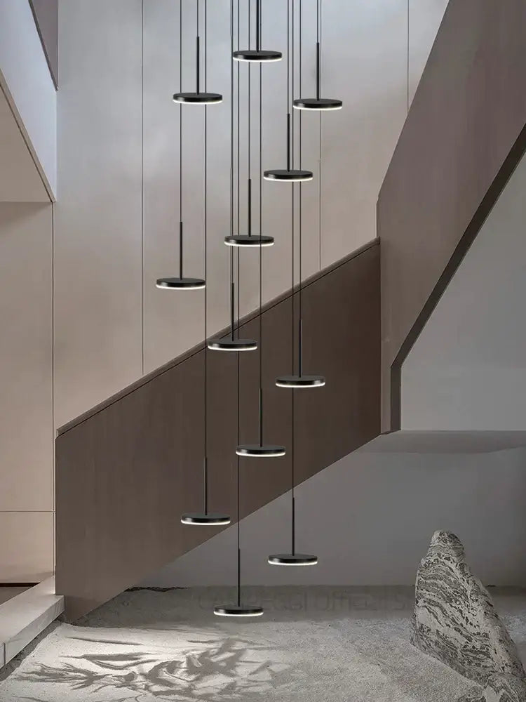 Modern golden black led long chandelier with sleek black led long circular pendant lights for staircase decorbites golden black