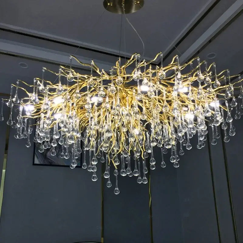 Modern golden branch crystal led chandelier with dangling teardrop pendants for living room decorbites crystal led design