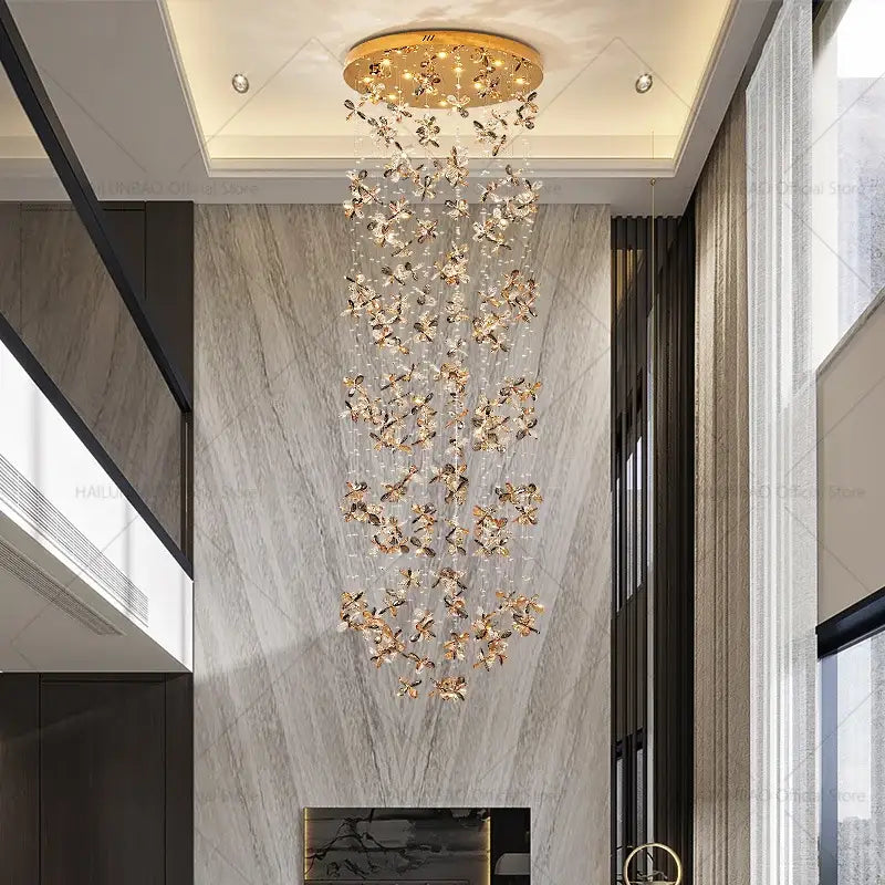 Modern golden butterfly crystal staircase chandelier lighting fixture with cascading crystal butterflies decorbites crystal staircase