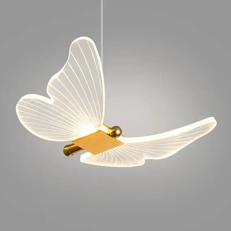 A modern golden butterfly led chandelier with translucent white wings and a warm metallic body for living room decorbites golden butterfly