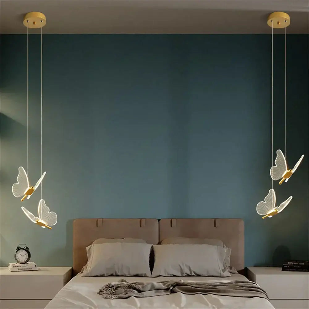 Modern golden butterfly led chandelier with delicate white butterfly-shaped pendant lights and gold accents for bedroom decorbites golden butterfly