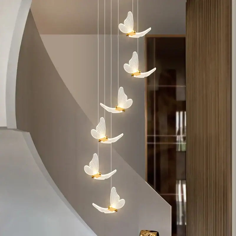 Modern golden butterfly led chandelier with five white butterfly pendant lights and gold accents for living room decorbites golden butterfly