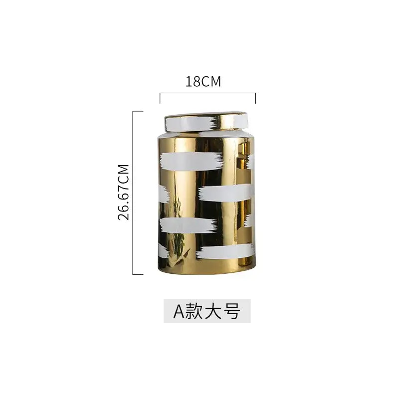 A sleek golden ceramic jar with white brushstroke stripes from the decorbites golden ceramic living room set