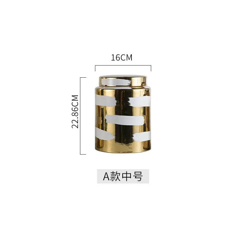 A modern decorbites golden ceramic jar with glossy gold finish and bold white stripes for living room storage