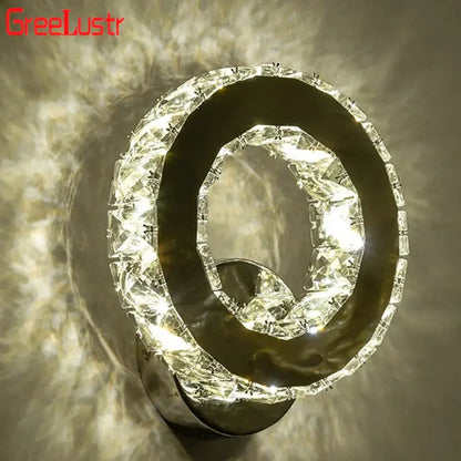 Modern golden chrome crystal led wall sconce with crystal-encrusted circular design and sleek metallic base for bedroom decorbites chrome crystal lighting