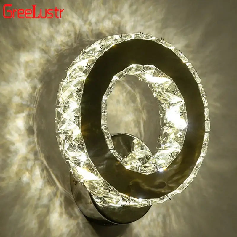 Modern golden chrome crystal led wall sconce with crystal-encrusted circular design and sleek metallic base for bedroom decorbites chrome crystal lighting