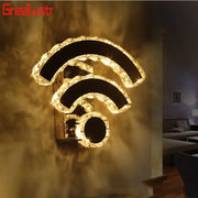 Modern golden chrome crystal led wall sconce with crystal-encrusted wi-fi symbol and sleek metallic base for decorbites chrome crystal decor