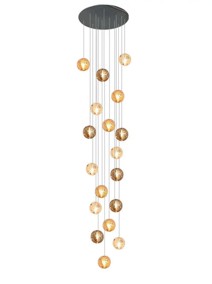 A modern golden crystal glass spiral ceiling chandelier with black mount and intricate decorbites crystal glass spheres