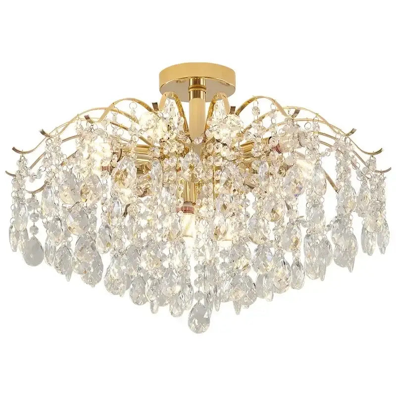 Modern golden crystal led chandelier with cascading clear crystal droplets and intricate curved arms for living room decorbites crystal led