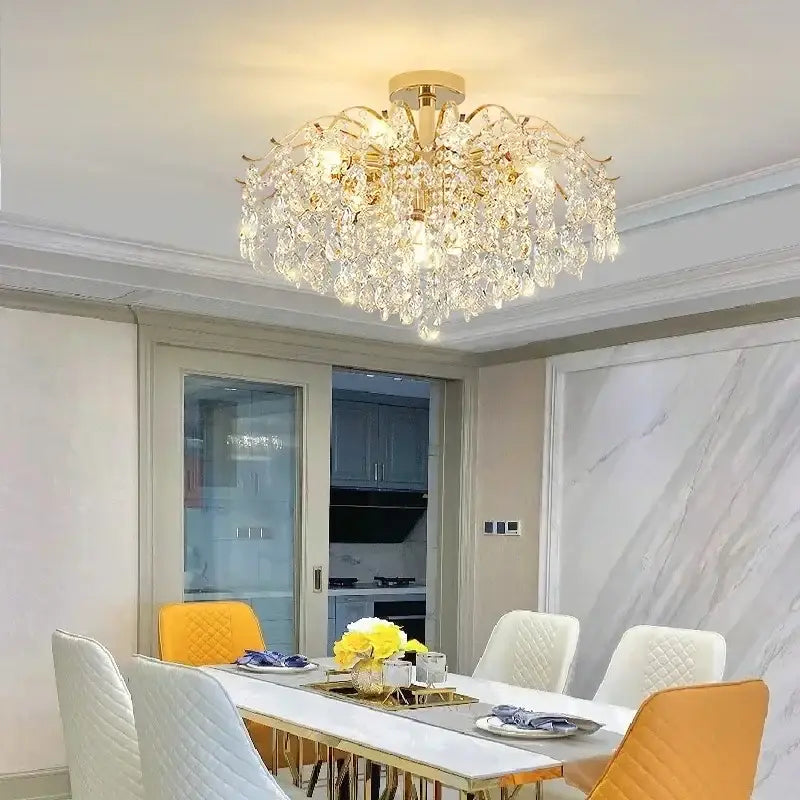 Modern golden crystal led chandelier with cascading crystal droplets and intricate metalwork for living room decorbites crystal led