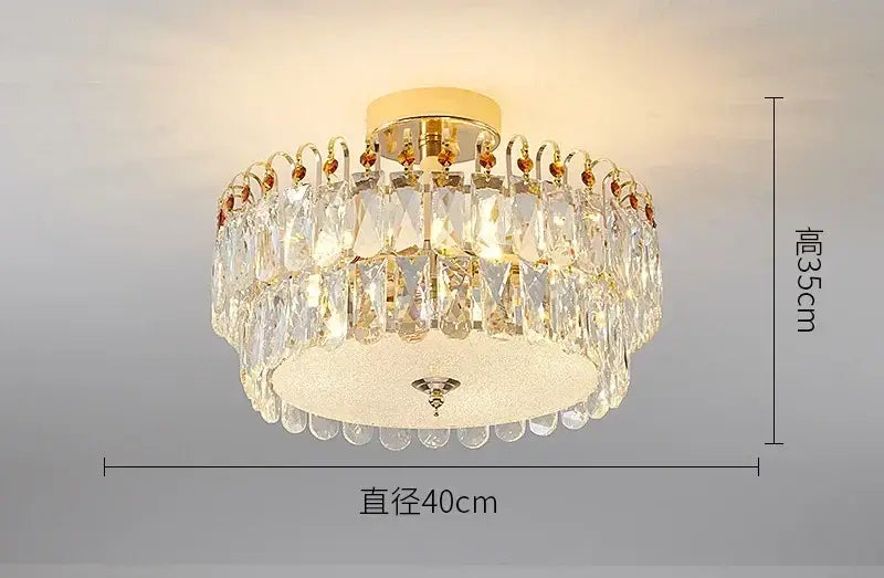 Modern golden crystal led chandelier with multiple tiers of clear faceted crystal droplets and frosted glass diffuser
