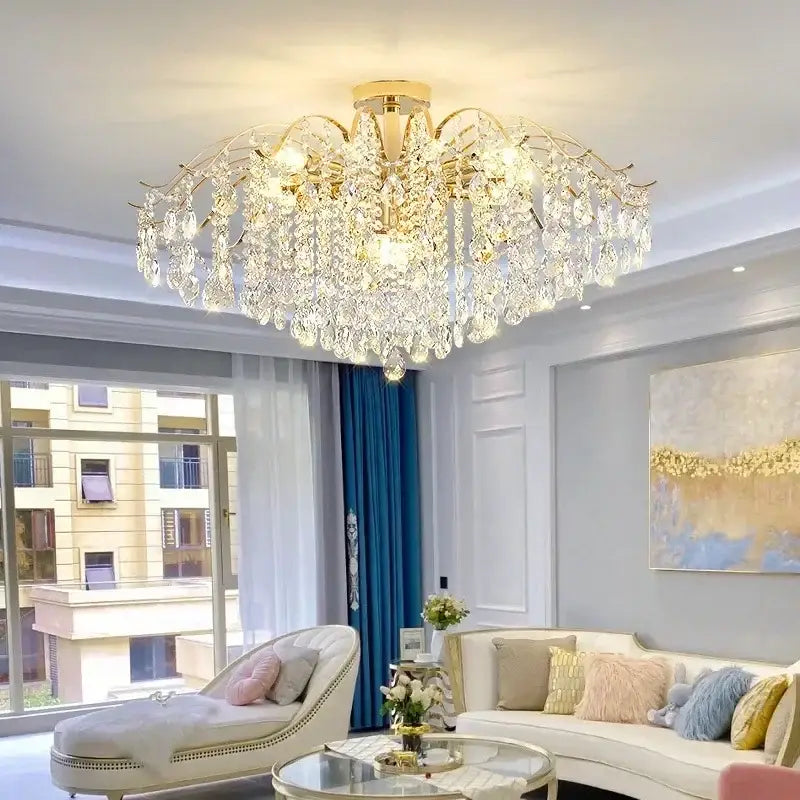Modern golden crystal led chandelier featuring a luxurious gold-toned frame with cascading teardrop crystals for living room decorbites crystal led lighting