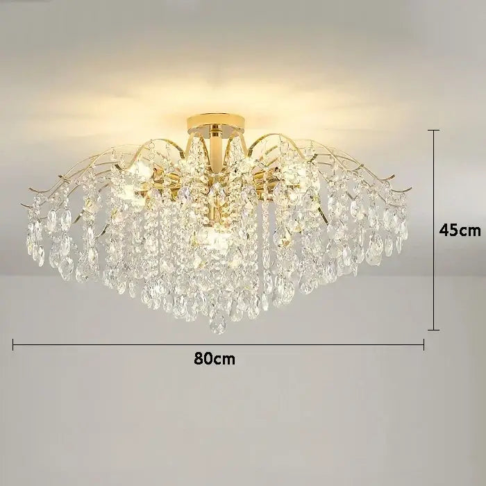 Modern golden crystal led chandelier with cascading clear crystal droplets for elegant living room decorbites crystal led