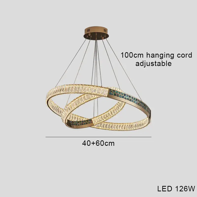 Modern golden crystal ring ceiling chandelier with gold-toned led interlocking rings and clear green crystal accents