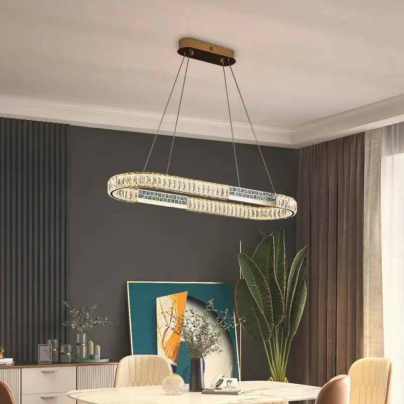 Modern golden crystal ring ceiling chandelier with oval gold-toned frame and clear crystal accents for dining room decorbites crystal ring