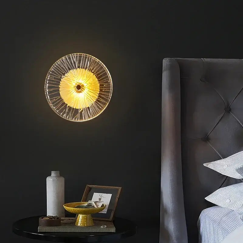Modern golden crystal wall lamp set of 4 featuring circular glass sconces with radiant golden centers and translucent spokes