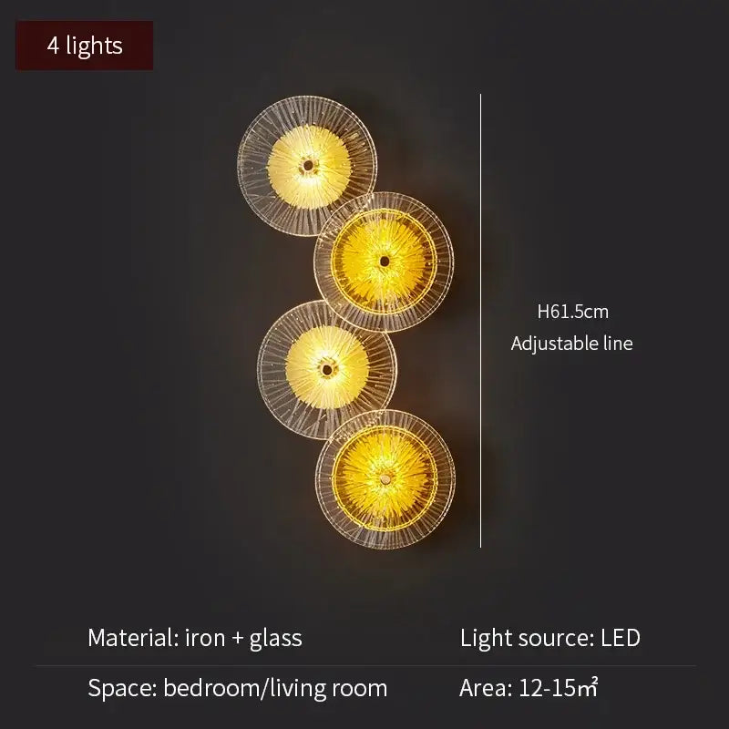 Modern golden crystal wall lamp set of 4 with translucent glass shades and radial iron frames emitting warm yellow light