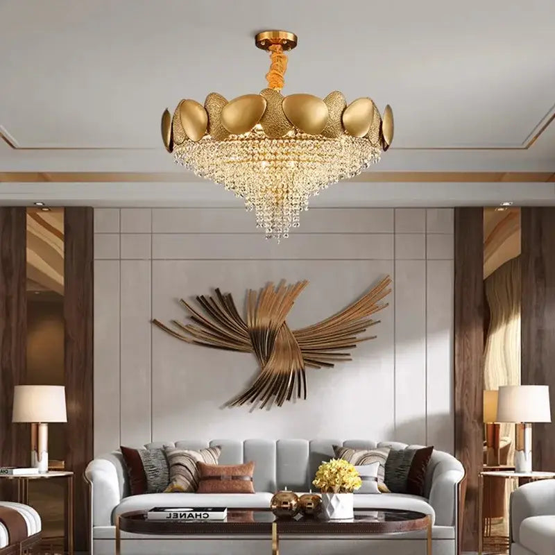 Modern golden decorbites crystal chandelier with lotus-inspired polished petals and cascading crystal droplets for living room