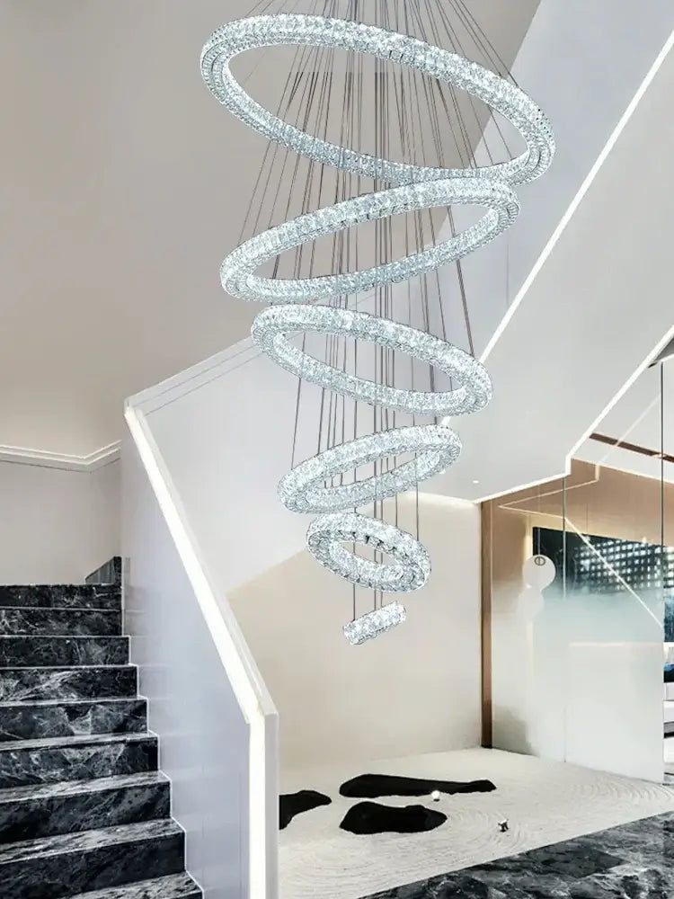 A sparkling silver decorbites crystal ring chandelier with concentric crystal embellishments for modern living rooms
