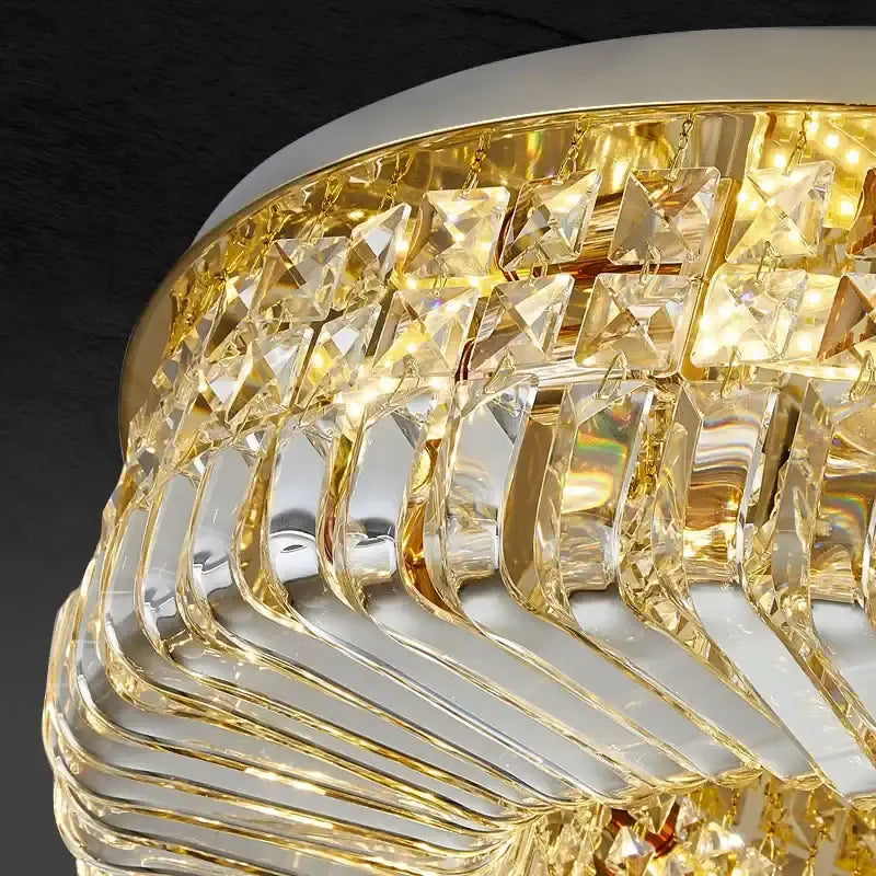 Modern golden decorbites crystal ring led ceiling lamp with gold-toned faceted glass tiers and polished metal accents