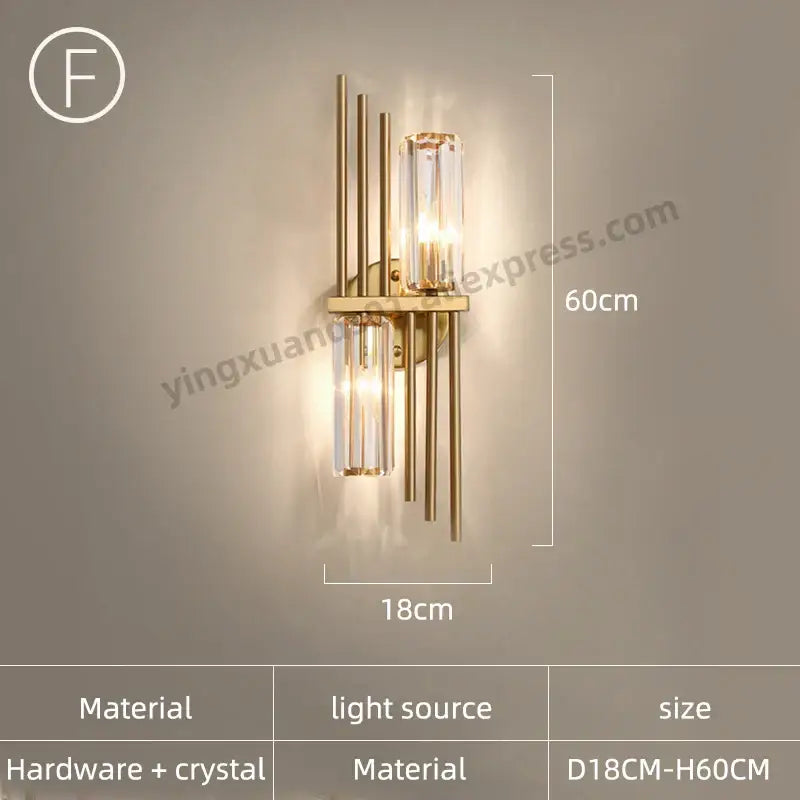 Modern golden decorbites crystal wall light featuring gold-toned sconce with vertical crystal accents for bedroom use