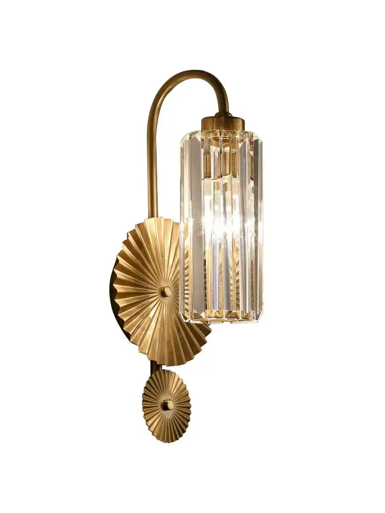 Modern golden decorbites crystal wall light with gold-toned curved arm and faceted crystal glass shade for bedroom use