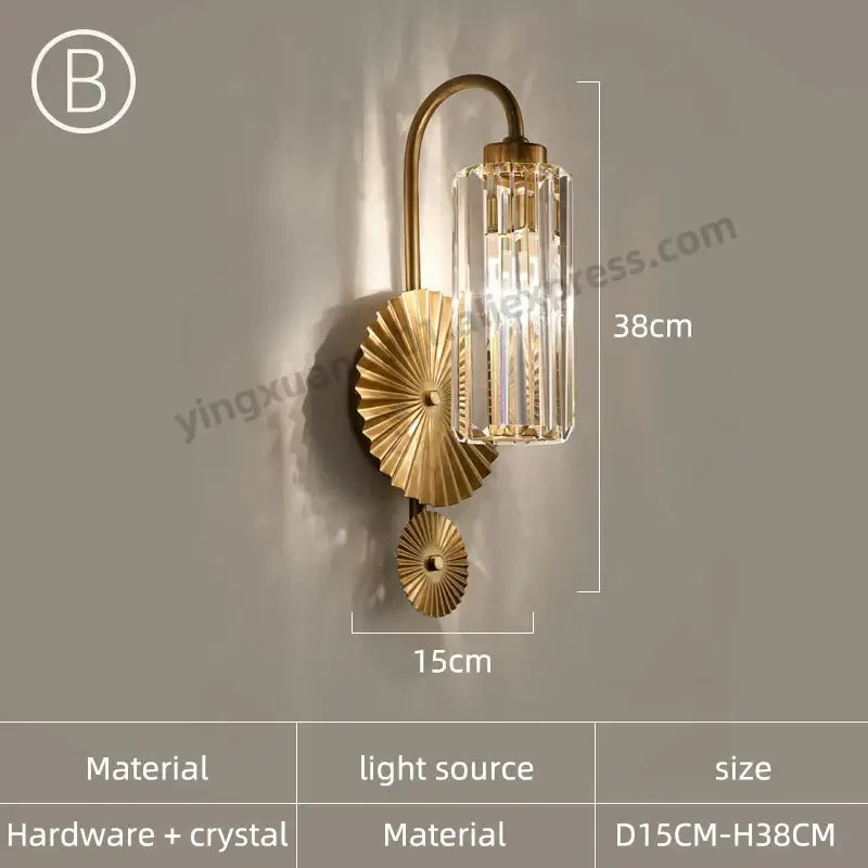 Modern golden decorbites crystal wall light with gold-toned fluted base and vertical crystal glass shade for bedroom
