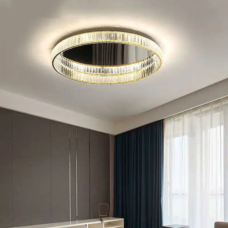 Modern golden double ring decorbites crystal led ceiling chandelier with faceted crystal and gold-toned trim emits warm glow