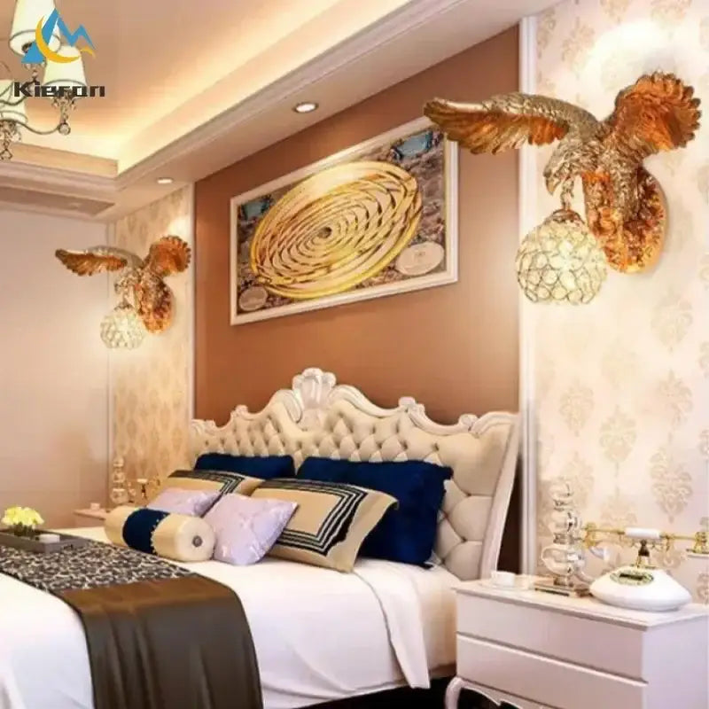 Modern golden eagle crystal led wall lamp with intricate feather detailing and crystal-encrusted globe base for living room