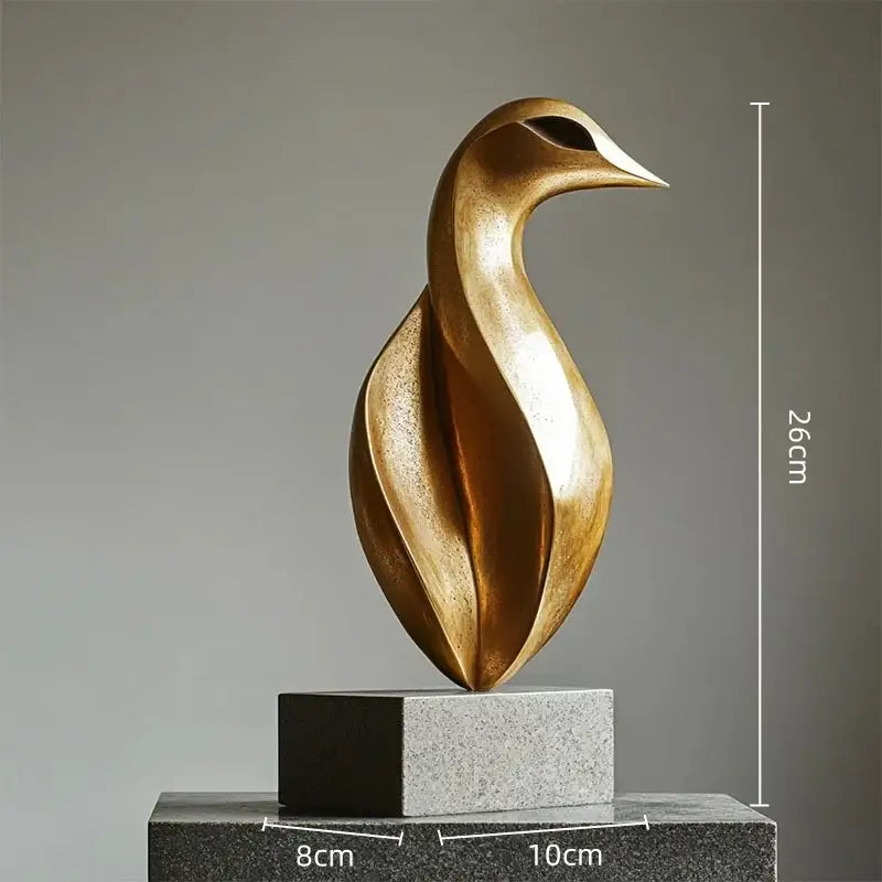 Modern golden geometric animal bird sculpture with sleek flowing curves and polished metallic finish for living room decorbites decor