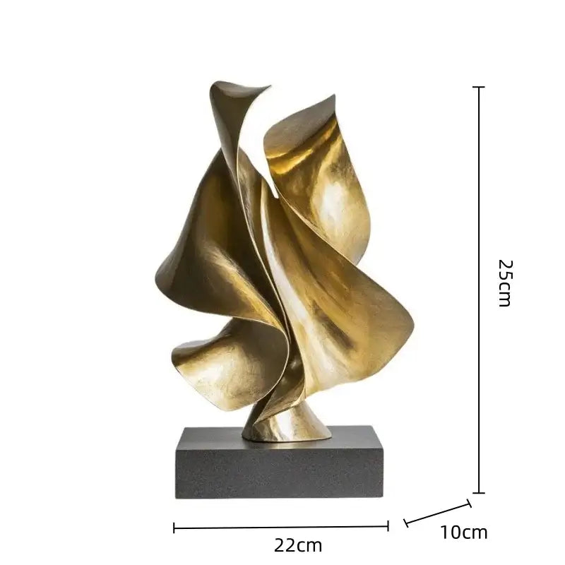 Modern golden geometric animal bird sculpture with flowing metallic forms on dark gray base for living room decorbites decor