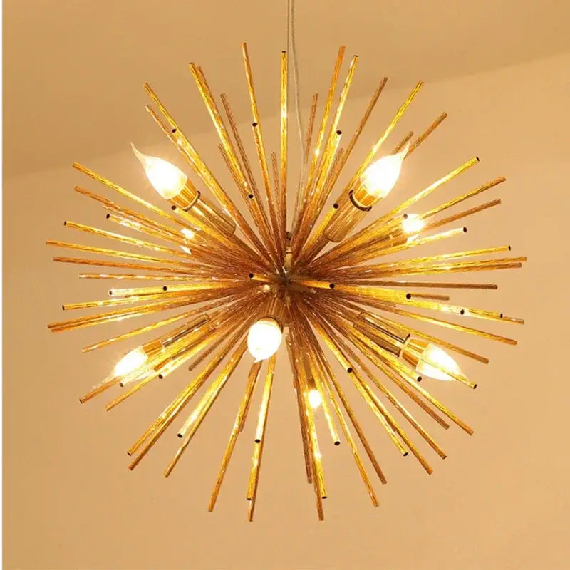Modern golden geometric ball chandelier with starburst design and exposed bulbs for dining room lighting decorbites geometric ball