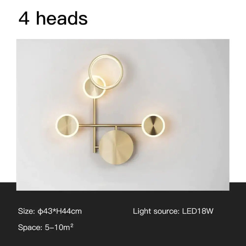 Modern golden geometric led wall lamp with four circular light heads in gold tone for living room wall lamp use