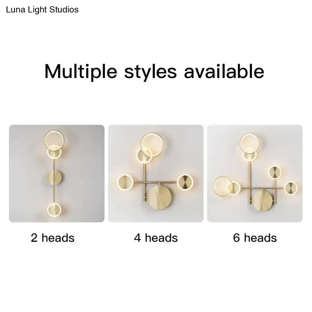 Modern golden geometric led wall lamp with circular gold-toned fixtures for living room wall lamp lighting