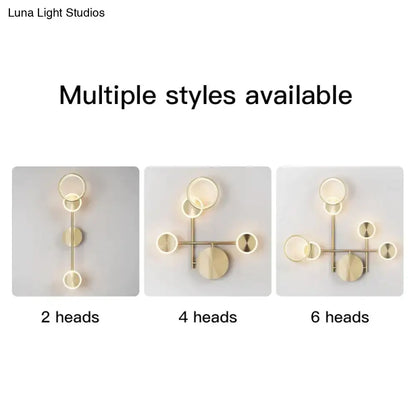 Modern golden geometric led wall lamp with circular gold-toned fixtures for living room wall lamp lighting