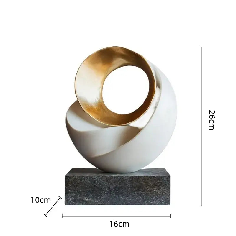 Modern golden geometric resin sculpture with white glossy spherical base for elegant home decor by decorbites