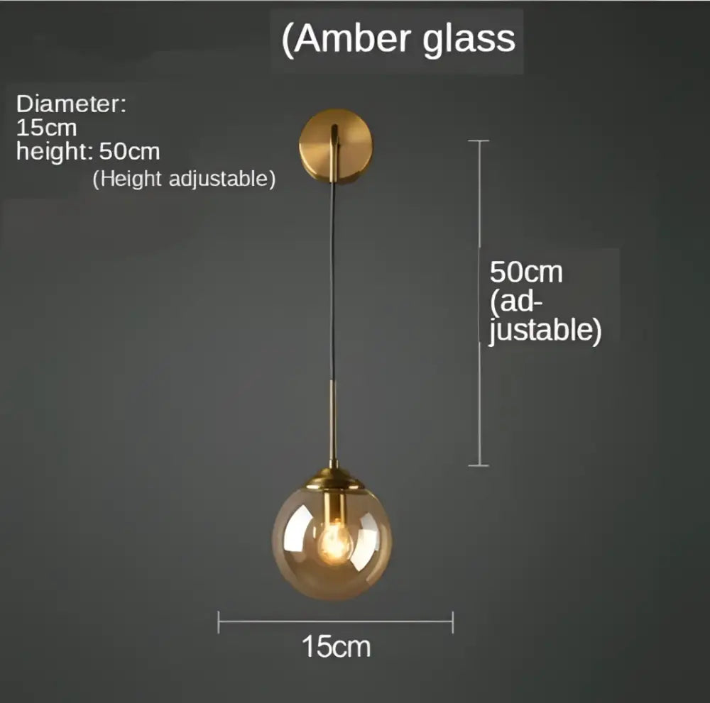 Modern golden glass ball wall sconce with amber glass pendant light and brass-finished mounting plate decorbites golden glass