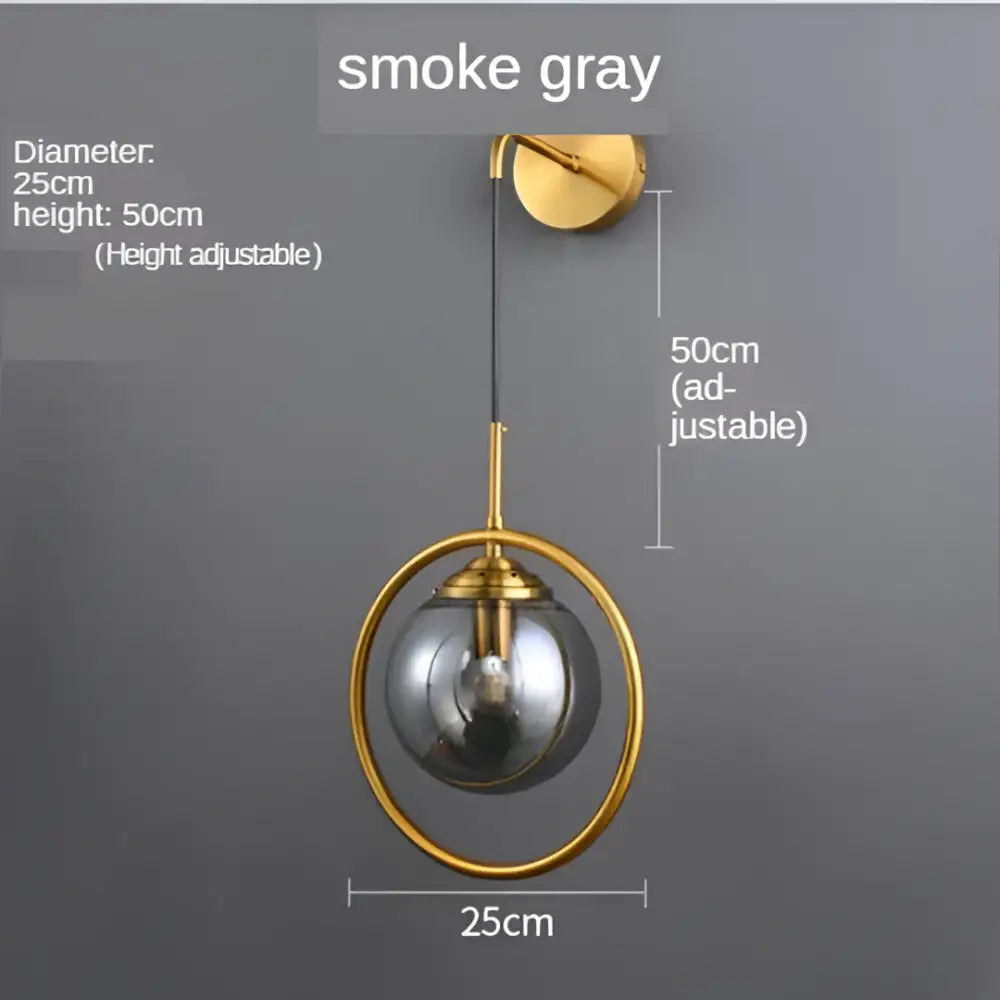 Modern smoke gray spherical glass pendant wall sconce with gold-toned metal ring and adjustable height bracket decorbites golden glass ball