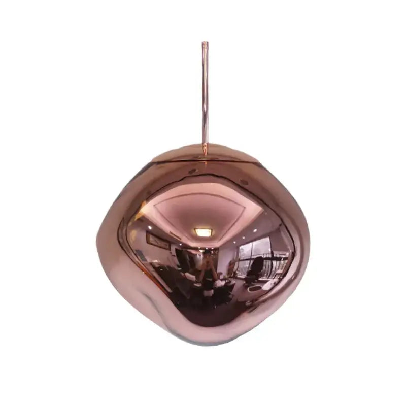A sleek rose gold glass lava pendant light with reflective metallic finish for modern dining room decorbites pendant lights