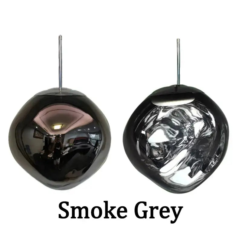Smoke grey glass lava pendant lights with sleek rounded design and reflective surfaces for dining room decorbites pendant lights