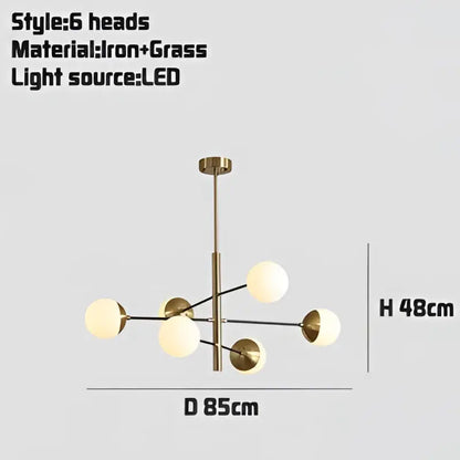 Modern golden glass magic bean chandelier in brass finish with six frosted glass light heads for dining room decorbites golden glass