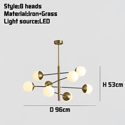 Modern golden glass magic bean chandelier with brass finish iron frame and eight frosted glass globe lights for dining room decorbites golden glass