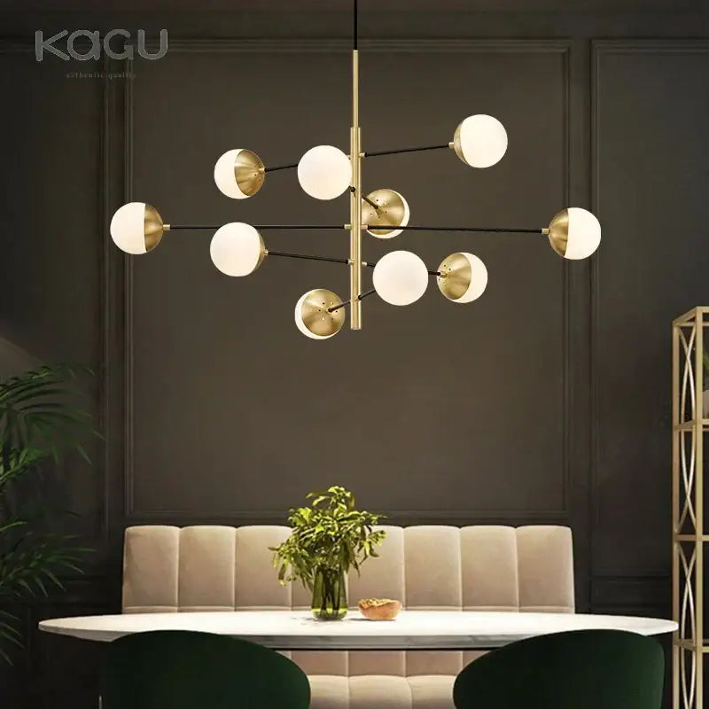 Modern golden glass magic bean chandelier with gold-toned frame and frosted glass shades for dining room decorbites golden glass