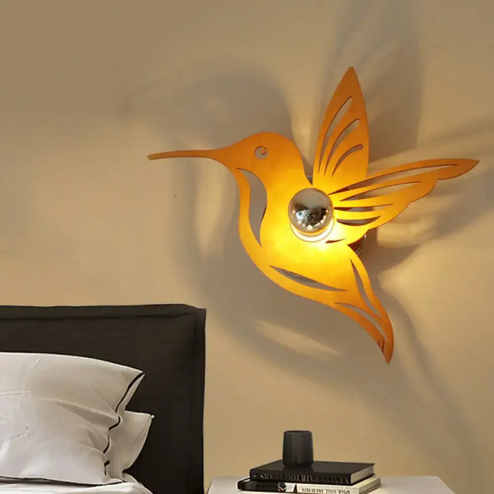 Modern golden hummingbird wall sconce bedside lamp with reflective spherical inch fixture for bedroom use