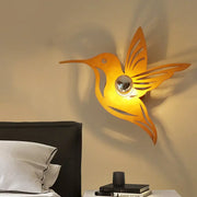 Modern golden hummingbird wall sconce bedside lamp with reflective spherical inch fixture for bedroom use