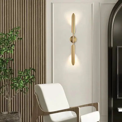 Modern golden inclined tube wall lamp featuring a gold-toned minimalist design with sleek vertical bars for luxury decorbites golden inclined living room use