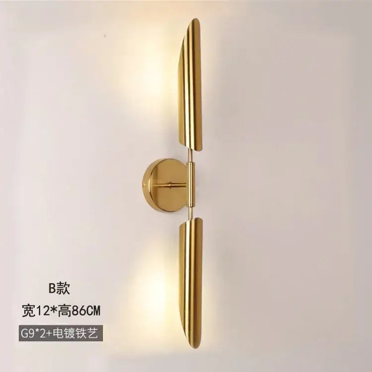 Modern golden inclined tube wall lamp with gold-finished vertical bars and circular mounting plate for luxury decorbites wall lamp