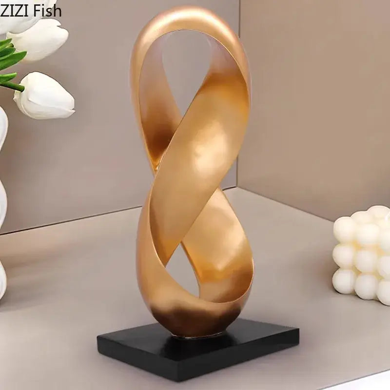 Modern golden knot sculpture with sleek intertwined loop design on black base for decorbites golden knot desk decor