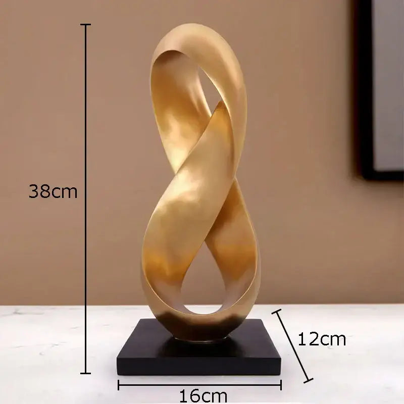 Modern golden knot sculpture featuring intertwined metallic loops on a black base for desk decorbites golden knot decor